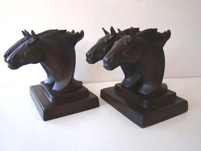 A fine and rare pair of  'Double Horse Head' bookends made by Frankart circa 1930.